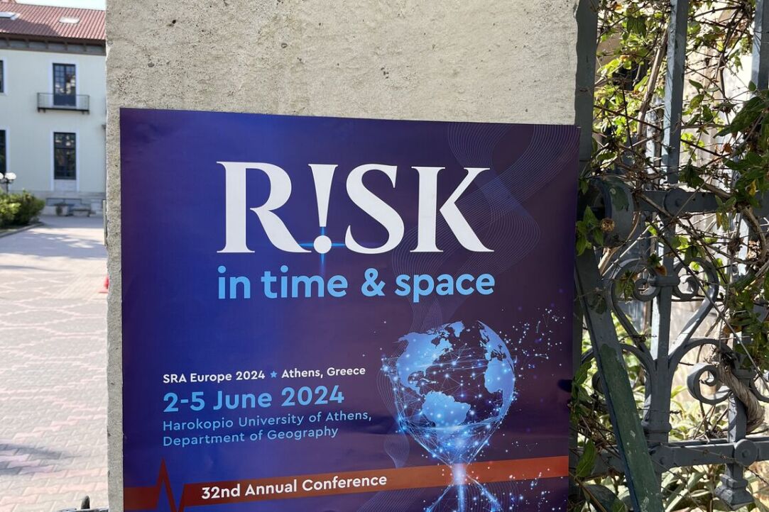 The banner of the Conference at the entrance to the University
